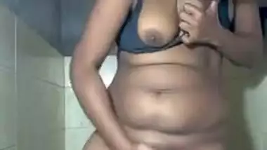 Horny Desi XXX girl licking her sweet boobs and fingering pussy MMS