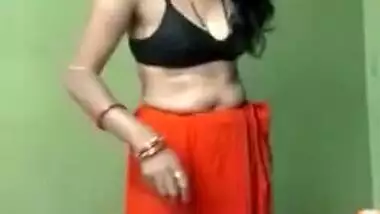 XXX video of naked Desi wife who puts clothes on item by item on cam