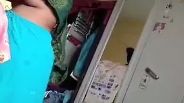 Grandmother wearing blouse and showing naked boobs