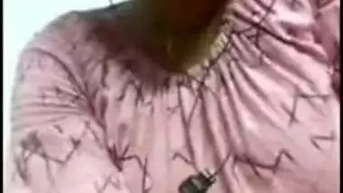 Sexy Desi mom exposes boobies to jerking off man on the other side