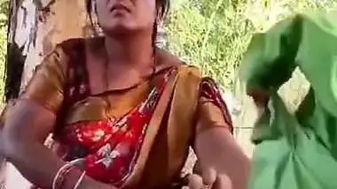 Outdoor sex of a handicapped man with a milf in the jungle