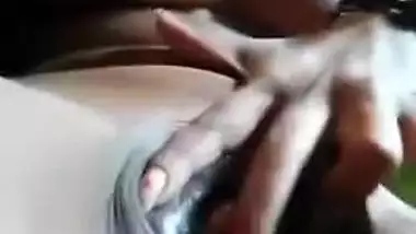 XXX porn lover fingers her own pussy in the homemade Desi clip MMS