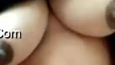 Spouse is horny and the Desi wife strokes his penis with hand