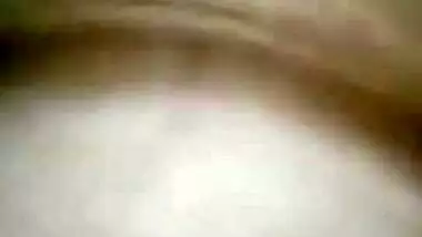 Indian holds a sex camera and touches her own XXX jugs and shaved slit