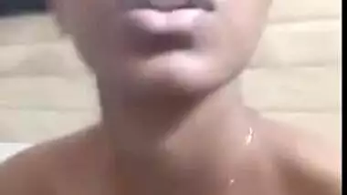 Nude Indian XXX girl smoking and showing her tits and cunt on selfie cam