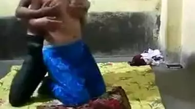 Half-naked young Indian woman allows man to come and touch XXX tits